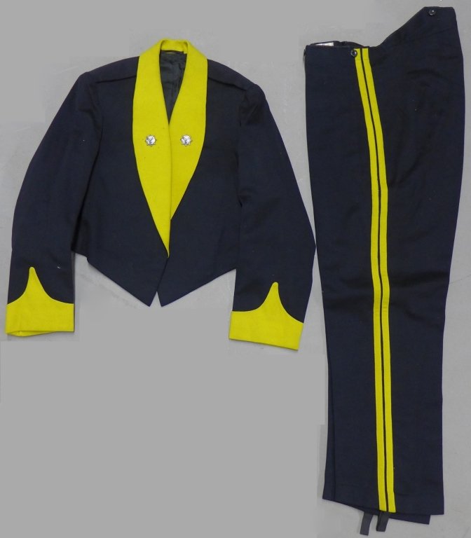 Shanghai Volunteer Corps Mess Jacket: Very rare (existing only between 1932-37) original British style Mess dress jacket in blue wool with yellow shawl collar and pointed cuffs, beautiful 8 point star enamel lapel devices incorporating fl