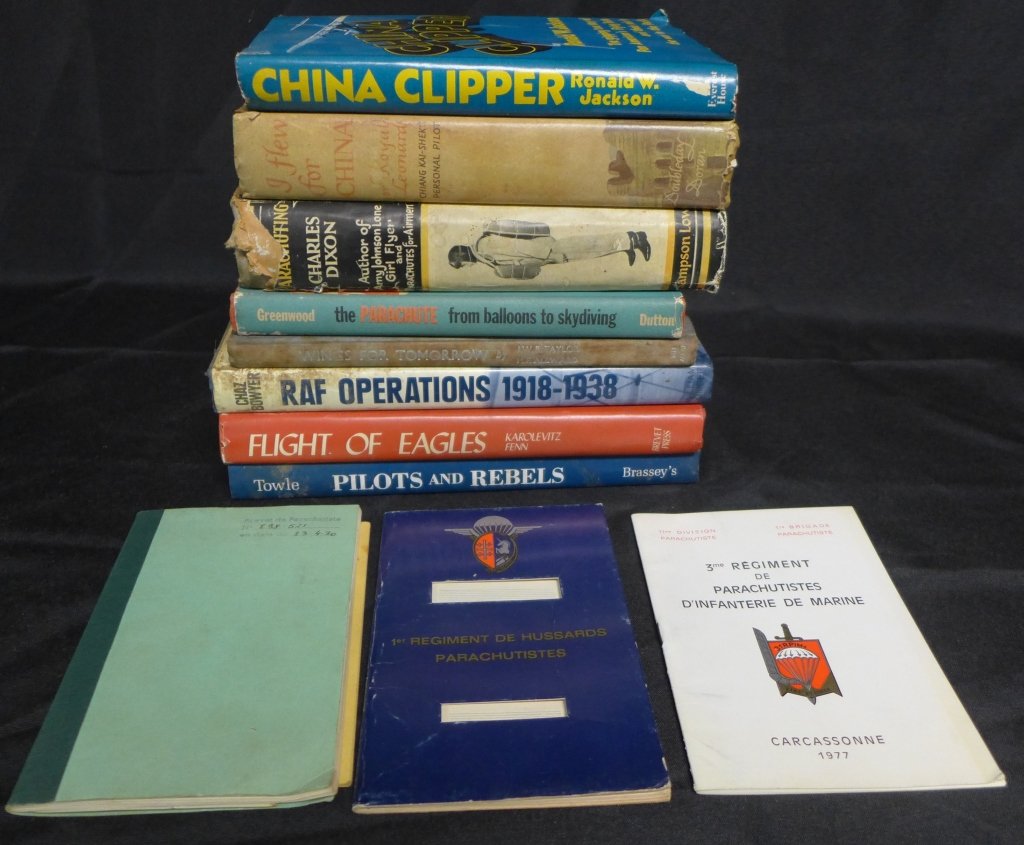 Books & Ephemera on Pilots and Parachutists: Books & Ephemera on Pilots and Parachutists. Includes: Paratrooper papers, passports and certificates, 1 regiment de hussard parachutiste passeport, 3me regiment de parachutiste d'infanterie de marine