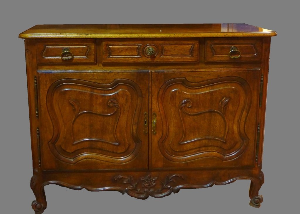 Country French Small Buffet/ Dresser: Beautiful carved wood buffet with scrolling and floral design. No noticeable maker's marks or labels. Three drawers above two cabinet doors. Doors open to reveal additional shelving and storage. Heigh