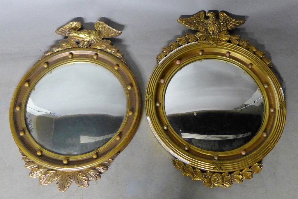 Pair Federal-Style Convex Mirrors: Two lovely gilt wood mirrors with eagle finial over the convex plate. The frames are similar, not the same. Some noticeable imperfections, wear and slight damages. Height: 30", Width: 22 1/2" (Girando