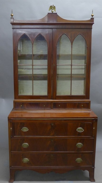 American Federal Cabinet, 18th C: Antique period secretary. Cabinet top and a flip-forward writing surface that rests on two pull-outs. Chest of drawer below. 3 drawers have brass handles with bald eagle design. Some noticeable wear a