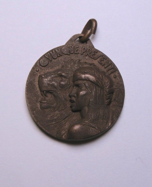 Italian Medal of Colonial Dubats Bands of Somalia: Italian Medal of Colonial Dubats Bands of Somalia. The obverse is depicting a head of a soldier and lion standing side by side, signed " Ovunque Presenti". The reverse is featuring image of a sword wi