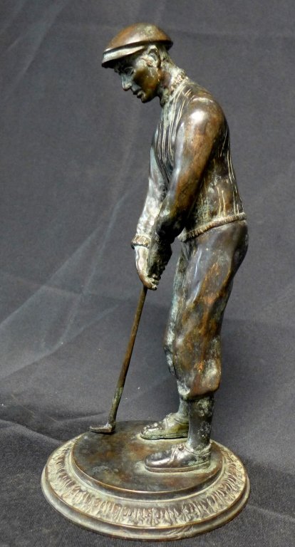 Patinated Bronze Golfer Sculpture: Figural bronze statue depicting a golfer, 20th century. On round base. Golf club is removable. No noticeable artist signatures. Height 13", Diameter of Base: 6" (sport, collectible, figurine, golfing,
