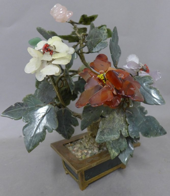 Jade and Gemstone Tree: Blossoms of polished aventurine, carnelian, amethyst, and rose and white quartz adorn the boughs of this gemstone/ hardstone decorative tree. Sits in a brass stand with inlaid aventurine. Maker's mark