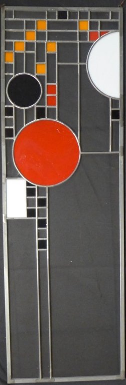 Stained Glass Window, after Frank Lloyd Wright: Beautiful stained glass window with stylized geometric design. In the style of Frank Lloyd Wright. Wright designed a similar one for a child's playroom. Height: 34 3/8", Width: 11", Depth: 1/4"(doll h