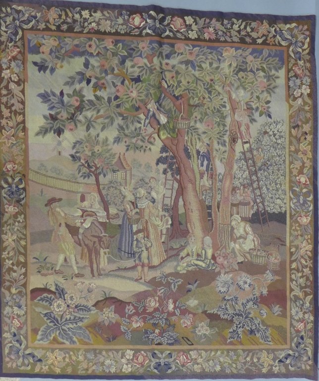 Langlois Blois Tapestry: French tapestry with outdoor figural orchard scene. Lovely ornate floral and ribbon border. Missing on hanging ring. Some slight imperfections and discoloration. Height: 61 1/2", Width: 52" (Aubusson,
