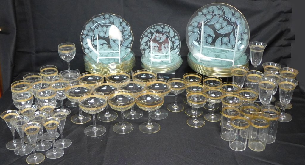 Glass Dinnerware with Gold Banding: Collection of glassware includes: -11 dessert plates. diameter: 6 1/4" -11 salad plates with ruffle rim. diameter: 8 1/4" -12 dinner plates. diameter: 9 3/4" -8 liquor glasses Height: 4 1/2" -8 Sherry