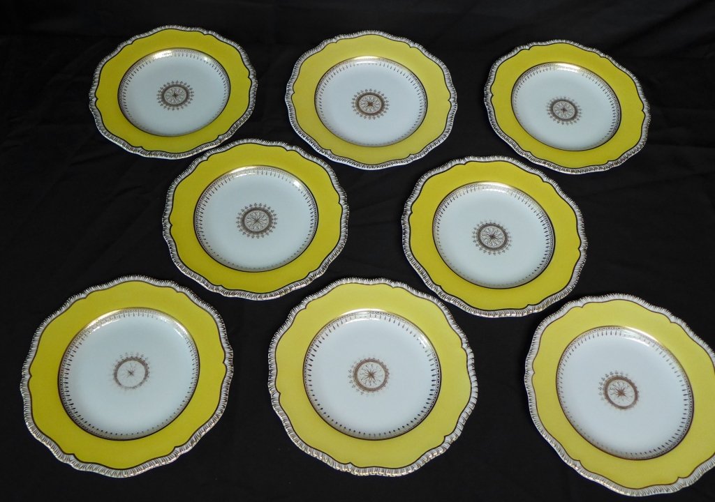 Copelands Fine China Dinner Plates, Set of 8: Lovely set of Copeland Spode Dinner plates with yellow and gilt design and ribbed rim. Some noticeable wear to gilding. Maker's marks on bottom. Some slight chipping. Diameter: 10" (medallion, England