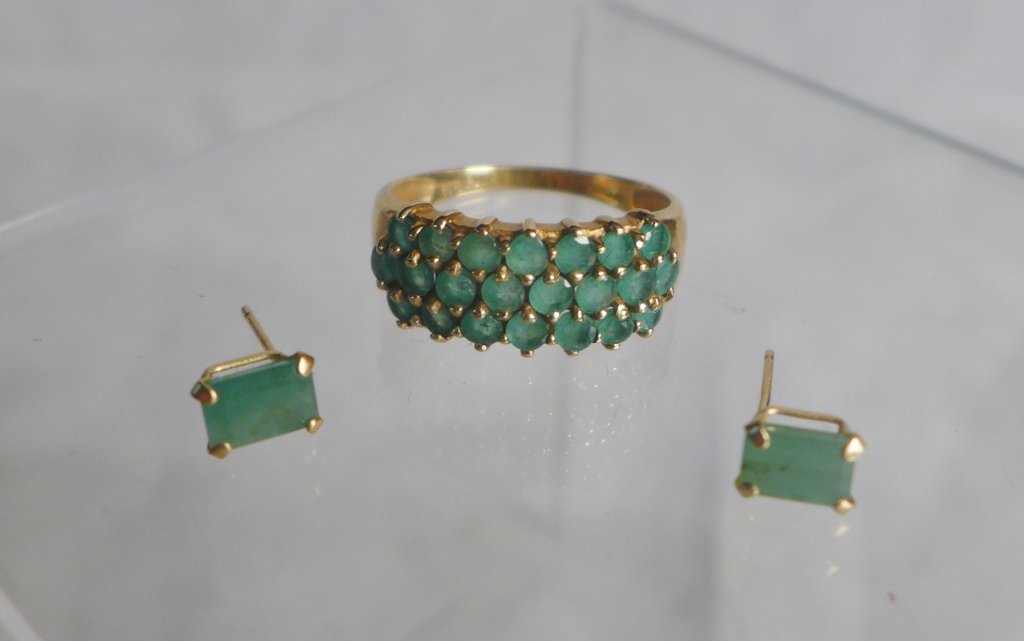 Emerald and Gold Earrings and Ring Set: Emerald and Gold Earrings and Ring Set. Ring is 18k yellow gold with three rows of emeralds (22 total) "18k / PDN" maker's mark. Earrings are solitaire emeralds set in yellow gold. Total approximate w