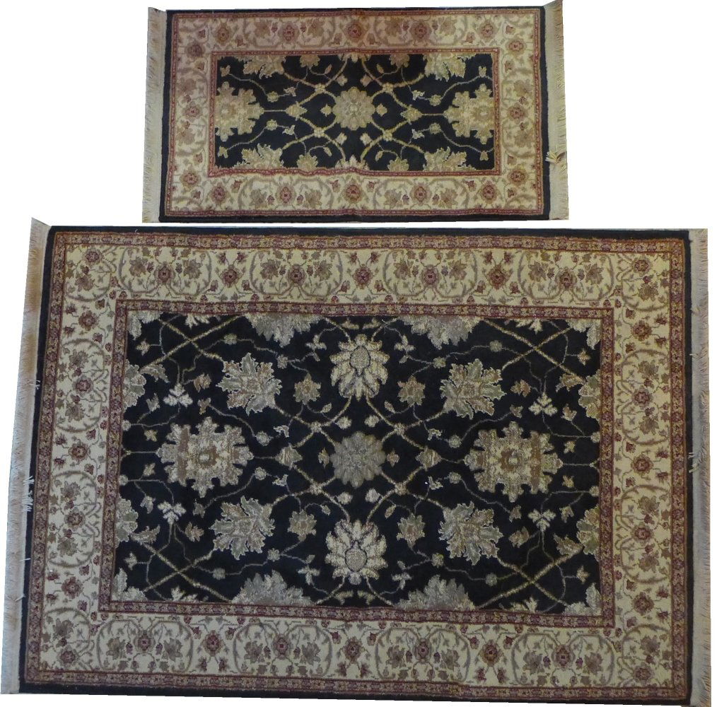 Pair of Sakkara Oriental Rug: Two Beautiful area rug features a stylized botanical pattern on a black background and a decorative beige outer border with blended colors of tan and gold along with accent colors burgundy and sage. M