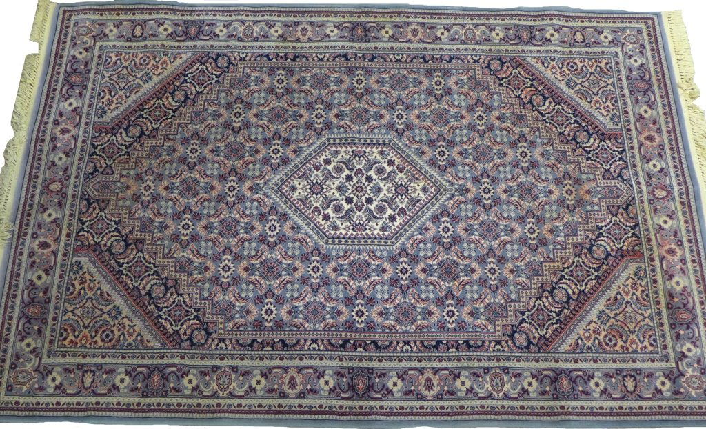 Vintage Karastan Kara Shah Rug: Blue Bijar pattern. Stylize floral design and center medallion. Maker's label on back side. 100% Worsted Wool Pile. Some slight imperfections/ discoloration. Length (not including fringe): 101", Width