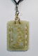Carved Jade Figural Pendant