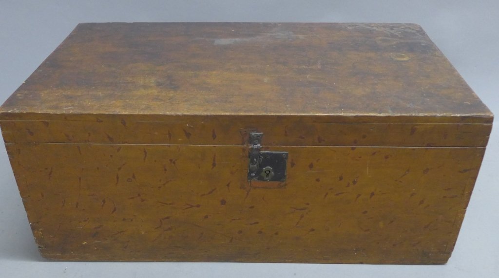 Vintage Wood Trunk: Vintage wood chest with iron hardware. Floral wall paper interior. No noticeable maker's label or mark. Height: 11 1/2", Width: 27", Depth: 15" Some imperfections and old restorations. (decorative acc