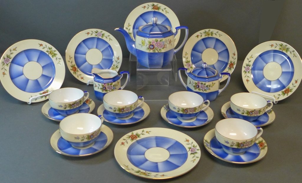 Noritake 'M' Tea Service w/ Dessert Plates: Noritake 'M' Tea Service and Dessert Plates. Service for 6.Set includes: Lidded Teapot, creamer, covered sugar bowl, 6 tea cups, 6 saucers & 6 dessert plates.Floral design with blue and gilt accents.B