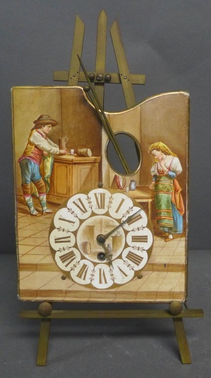 Antique 8 Day Artist's Easel Form Timepiece: French painted porcelain and bronze easel form clock, circa 1900. Marked on back of clock: Empoli & Modele Deposes, Sous Le No. 19567. French maker's label on back of porcelain. Height: 17", Width: 9