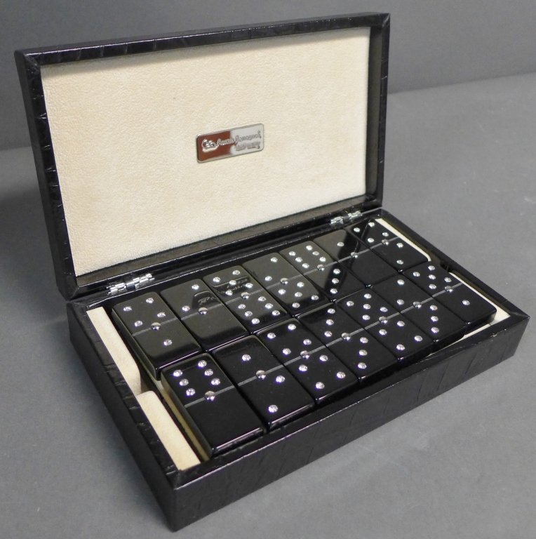 Renzo Romagnoli Domino Set: Renzo Romagnoli's Swarvoski crystal-studded dominoes. Full set of brilliant bones is nestled within the stunning black crocodile skin case, featuring a sleek interior and a silver plaque bearing the c