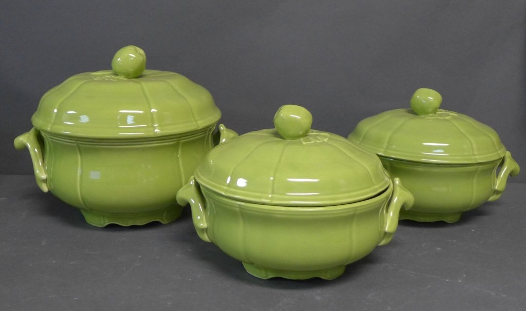 Grouping of Longchamp French Pottery: Three lidded tureens. All with sculpted applied handles. Beautiful chartreuse glaze. Maker's mark on bottom. Total height of largest piece: 9" (kitchenware, decorative accessory, pottery, porcelain) S
