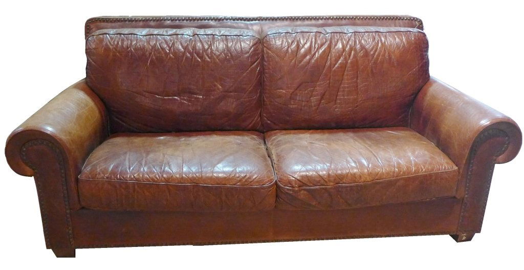 Long Leather Club Sofa Couch: Beautiful English brown leather couch with deep seating. Stunning textured brown leather. With large decorative nail head accents. Cushions are not removable. No noticeable maker's label. Some slight