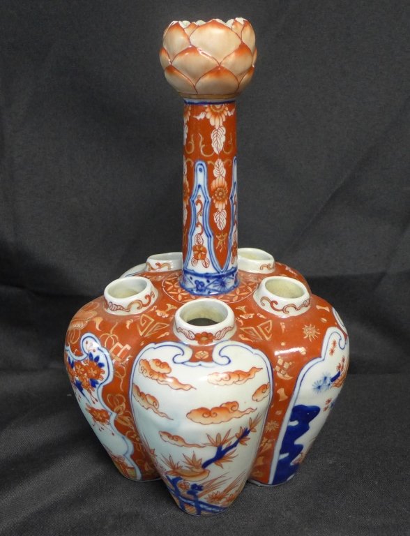 Rare Imari Tulip Vase: Stunning Asian Imari porcelain tulip/ crocus/ lotus flower vase with 6 openings. Ogee shaped with five-lower floral inserts and stem/turret shaped top opening for long stem flowers. No noticeable make