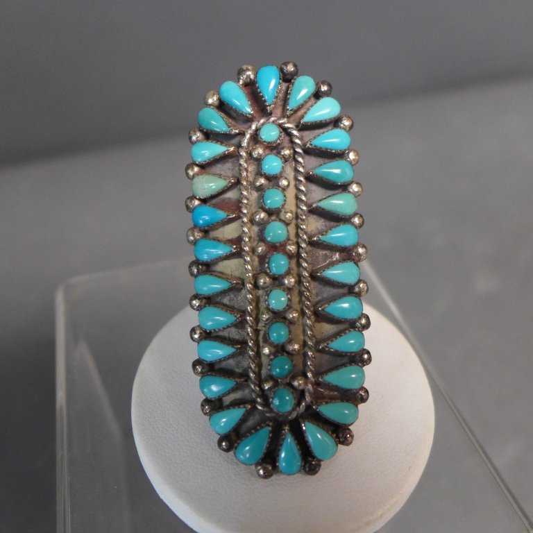Vintage Turquoise Petit Point Ring: Stunning silver and turquoise petit point ring in oval cluster form. Hallmark: G. Size: 10. Length: 2 1/2", Width: 1 1/8" (Zuni ring, jewelry, fashion, accessory) STERLING ASSOCIATES STRIVES TO PROVID