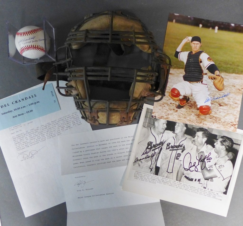 Del Crandall JSA Baseball & Signed Catcher's Mask: Delmar Wesley Crandall is an American former professional baseball player and manager. He played as a catcher in Major League Baseball and played most of his career with the Boston & Milwaukee Braves.