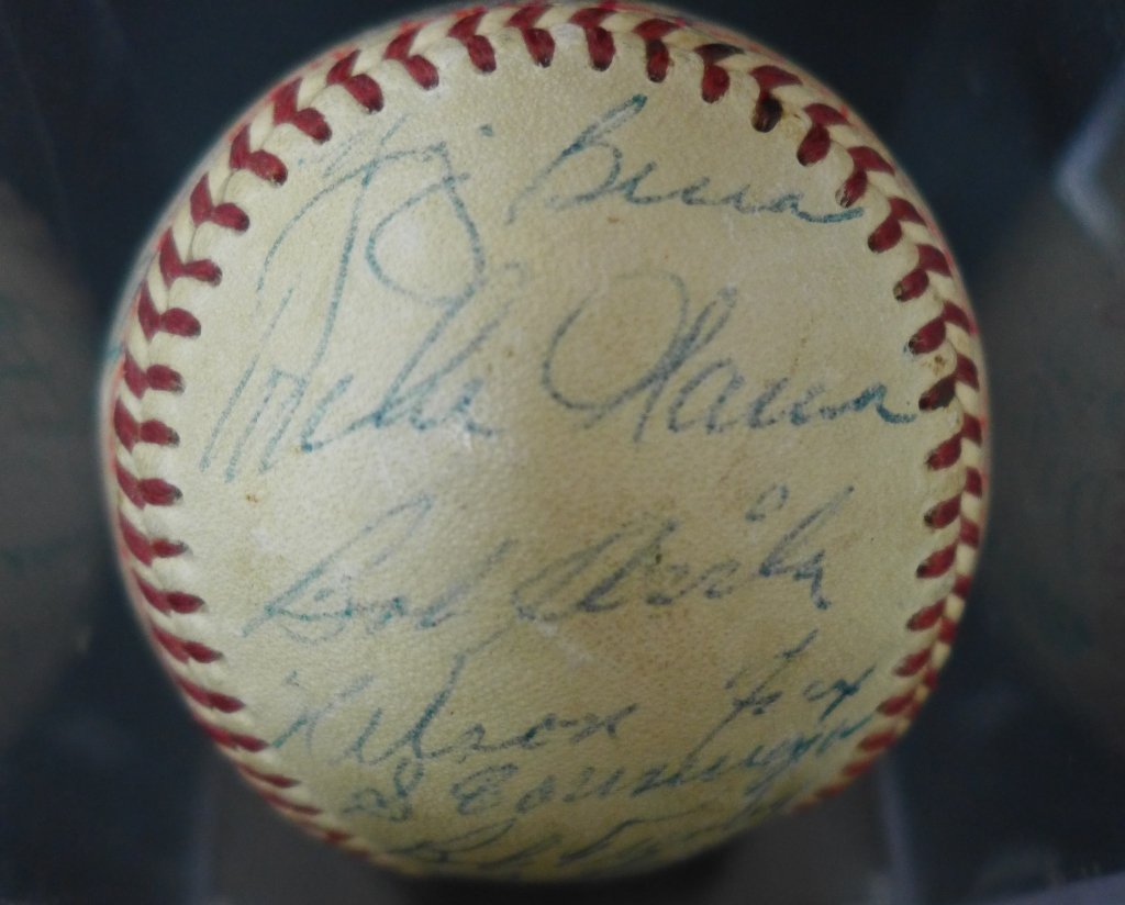 1954 American League All-Stars Team Signed Ball: 1954 American League All-Stars Team Signed Baseball. JSA Cert # Z 21211. Includes letter of Authenticity from JSA. 31 Signatures include: Mickey Mantle, Y. Berra, N. Fox, B. Lemon, Ted Williams, Harri