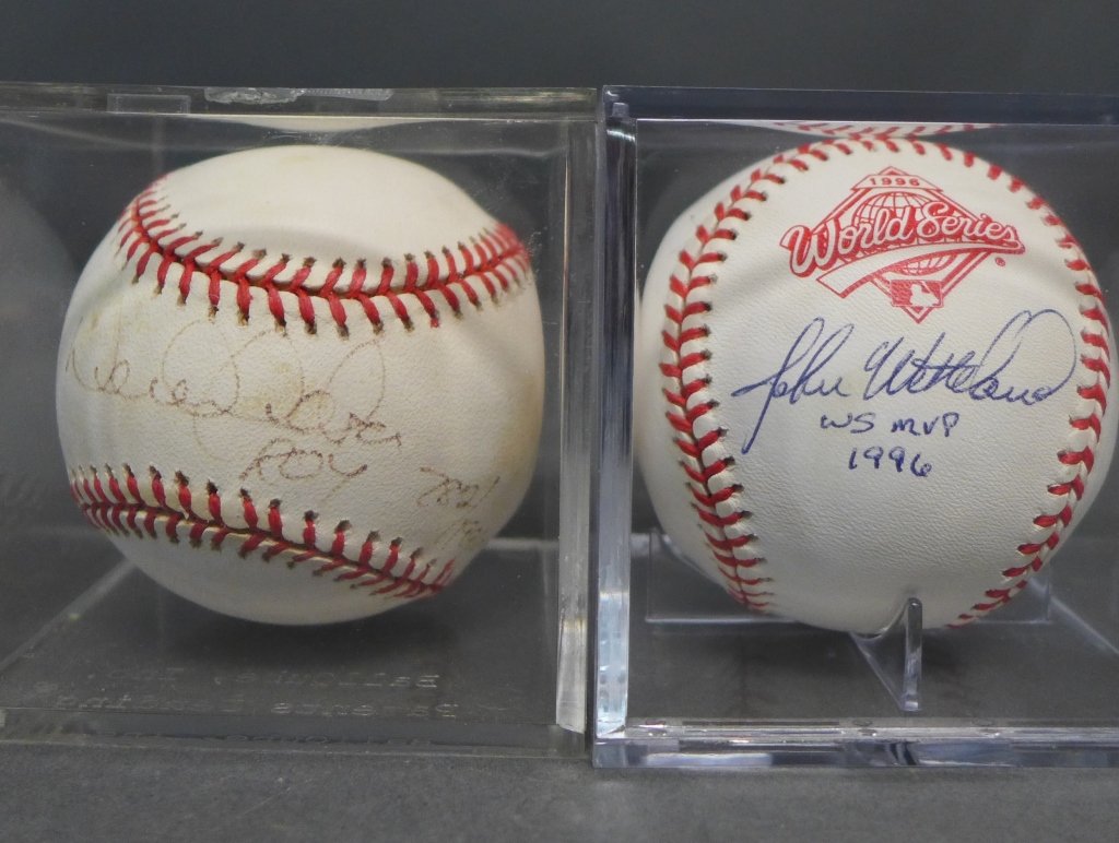 Yankees 1996 World Series Autographed Baseballs: Two Yankees 1996 World Series Autographed BaseballsIncludes: - John Wetteland New York Yankees Autographed Baseball with 96 WS MVP Inscription, - Derek Jeter "ROY 782/1996". In clear plastic display b