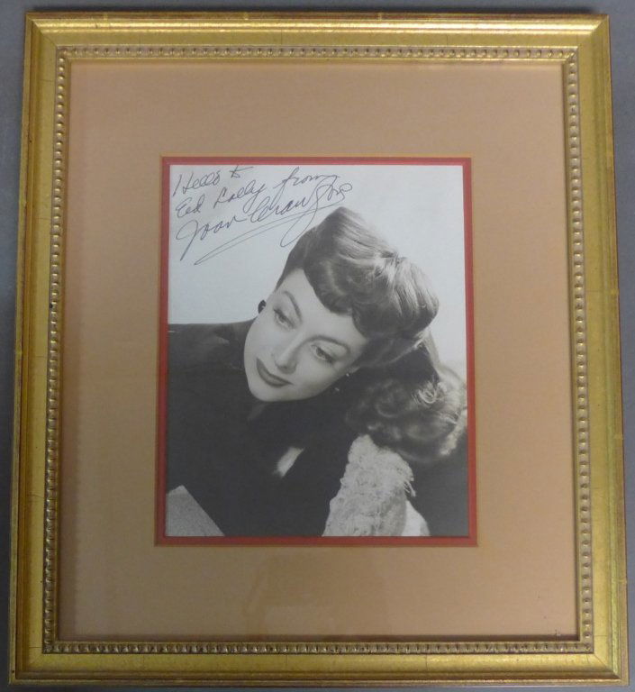 Autographed Photo of Joan Crawford: Black and white autographed photo Joan Crawford, American film and television actress. Inscription and signature on top left of photo. Framed and matted under glass. No COA included. Height: 16", Widt