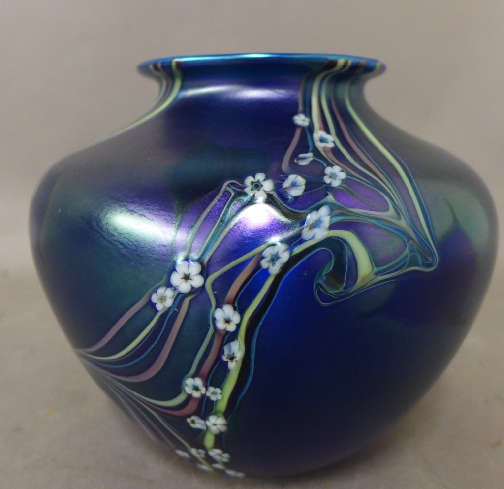 Iridescent Art Glass Vase: Beautiful iridescent art glass vase with floral design. 20th Century. Signed and dated on bottom edge: Orient & Flume. Height: 6", Width: 6 1/2"(art glass, studio glass, collectible, interior design)S