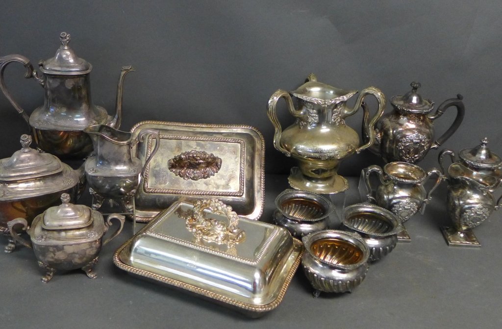 Large Silver Plate Grouping: Large collection includes: -Four piece tea set: tea pot, creamer, covered bowl and bowl. Makers mark on bottom: Wilcox Silver Plate Company Quadruple Plate Meriden Conn. -Three footed bowls with maker