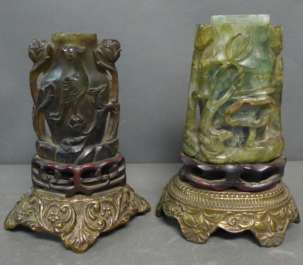 Pair Chinese Carved Jade Vases as Lamps: Two lovely table lamps. Both jade vases sit on carved wood stands and brass bases. Some chips, cracks and imperfections. Heights: 10 1/2" & 9 1/2" (lighting, phoenix, floral, flower, interior design) 