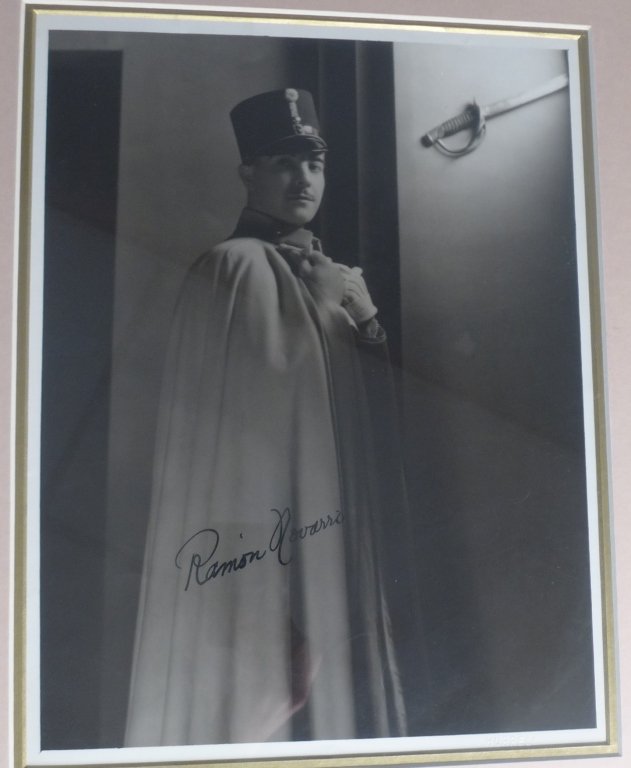 Ramon Novarro Autographed Photo: Black and white photograph of Ramon Novarro. Signed. Framed & matted. No COA. Height: 19"; Width: 16". Image Size Height: 12 1/2"; Width: 9 1/2". Jose Ramon Gil Samaniego, best known as Ramon Novarro 