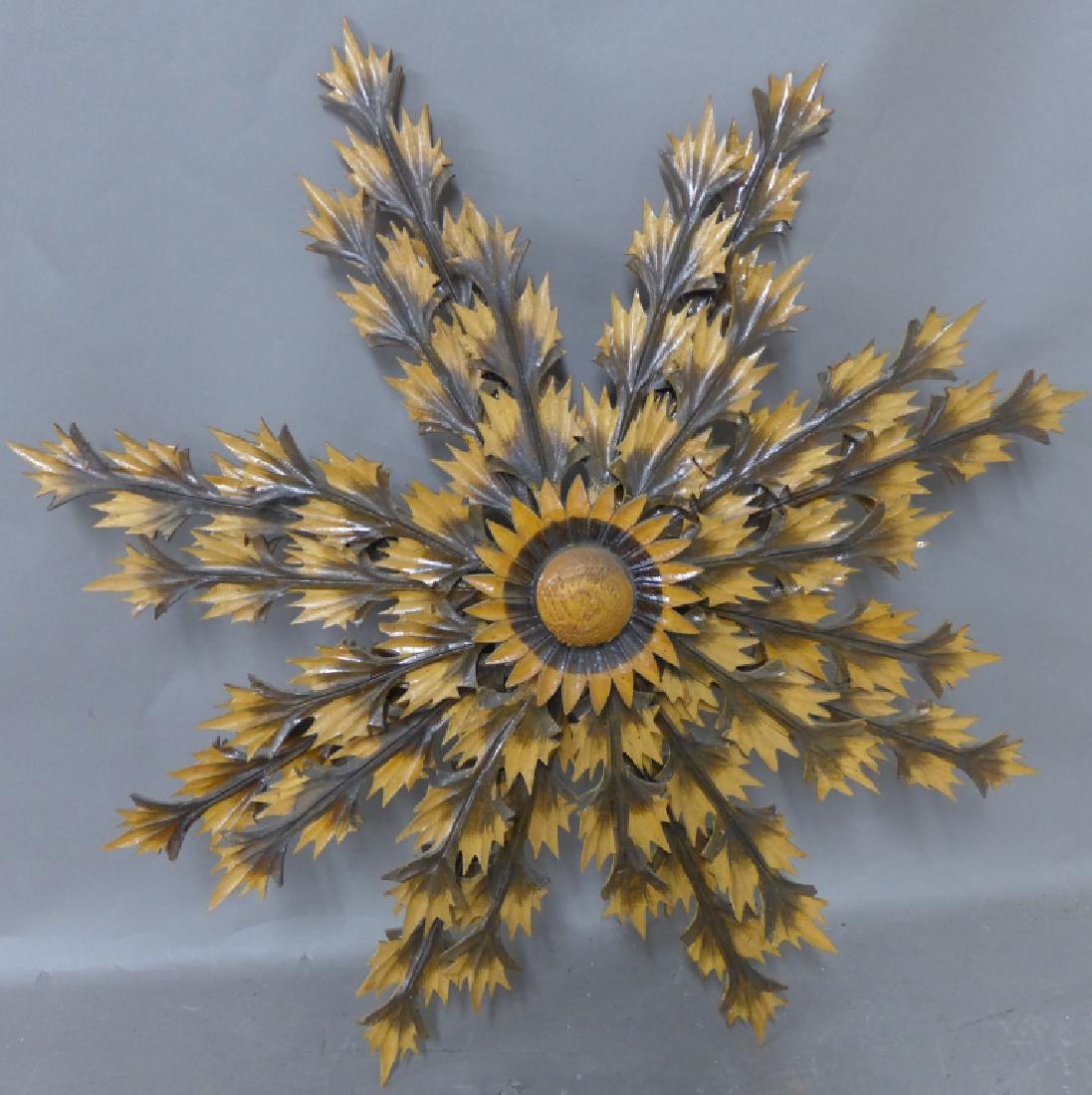 Large Hand Carved Wooden Polish Wall Sculpture: This beautiful folk art piece was cut and shaped by hand. Stylized central star burst and surrounding leaf/ petal design. Decorative staining and varnishing. Most likely beech wood. Height: : 29 1/2" 