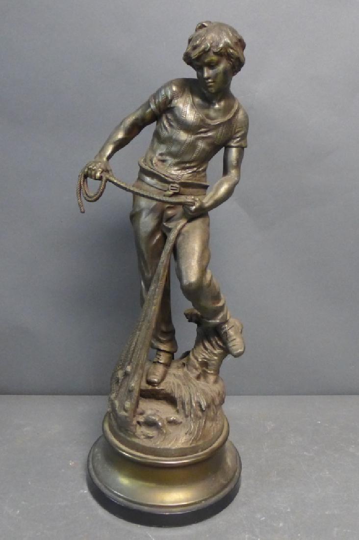 Moreau Sculpture as Lamp: Patinated spelter statue of a young boy. Paris foundry mark on back. Signature incised: L&F Moreau. Some imperfections and wear to finish. Lamp cord pipe cut at back. Height: 25", Width: 9 1/2" (fine