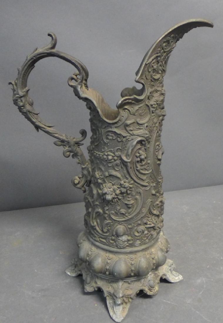 Renaissance Revival Ewer: Beautiful ewer decorated with faces, fruits and scrolling designs. Patinated spelter. On four feet. Height: 18", Length: 12", Width: 9 1/2" (decorative, antique, pitcher, vintage) STERLING ASSOCIATES 