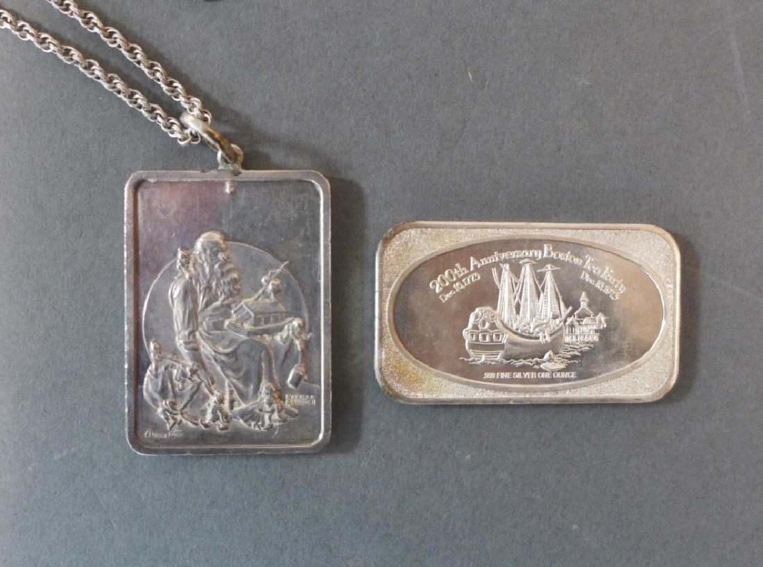 Two .999 Fine Silver Troy Ounce Ingots: Includes 200th Anniversary Boston Tea Party .999 Fine Silver 1oz Ingot and 1975 Norman Rockwell Slumbering Santa Christmas Ingot One Troy Ounce Silver on sterling silver chain. Chain clasp marked ster