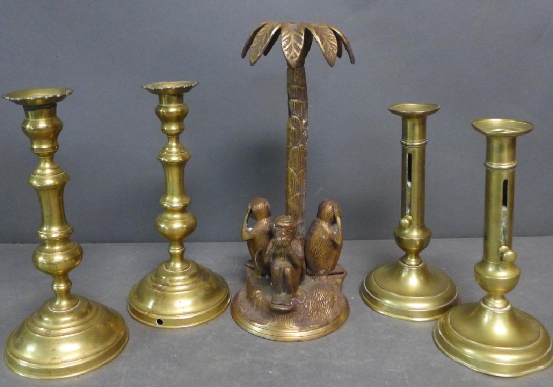 Brass Candlestick Grouping: Collection of 5 vintage candlesticks includes two pairs and a unique "see no, hear no, speak no evil" sculptural candlestick depicting 3 monkeys sitting under a palm tree. Heights: 9"- 12 1/2". Some s
