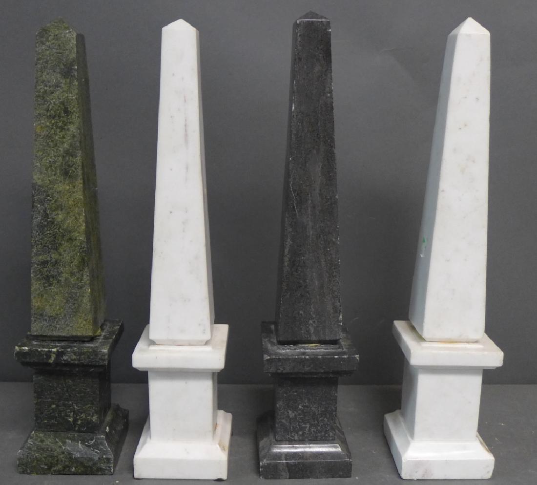 Marble Obelisks: Grouping of four marble obelisks. Slight chipping at edges and exposed glue. Height: 16", Width: 3 1/4" (statue, sculpture, fine art, table top accessory) STERLING ASSOCIATES STRIVES TO PROVIDE ACCURA