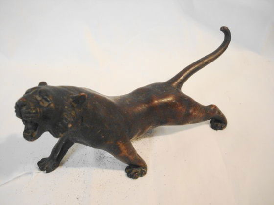 Japanese Bronze Panther, chopmarks on belly: Oriental sandcasted bronze of a roaring panther.9 3/4" length. 4 1/2" height.Artist chop marks on belly.