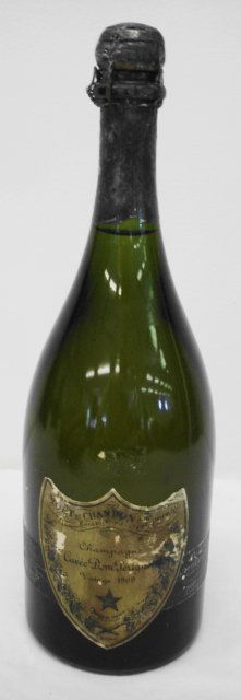1969 Dom Perignon Champagne: 1969 Dom Perignon Champagne, as is.Condition: Unopened. Loss to foil seal noted. Auctioneer's Note: We can not guarantee the details of storage.Provenance: Private estate.