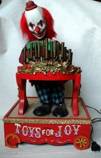 Automaton Mechanical Clown w/ Pipe Organ: Automaton Mechanical Clown w/ Pipe OrganTitle:"Toy for Joy"Materials: Paper Mache Face, metal mechanical works, felt costuming & wood.Dimensions: 21.6" (H) 12" Base widthCondition:Good aesthetic condi