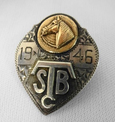 Sterling Visalia Stock Saddle Co. Scarf Bolo,1946: Sterling Visalia Stock Saddle Co. Scarf Bolo, with gold wash horse's head. Monogrammed"STBC" and dated 1946. Marked on reverse: Visalia Stock Saddle Co., S.F. Cal, sterling. Dimensions: 1 5/8" x 1 3/8