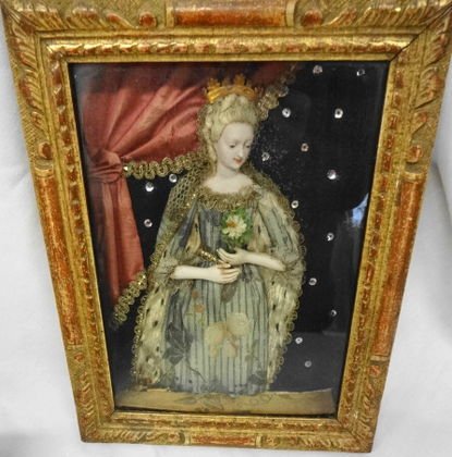Victorian Shadowbox, Bisque Figure of Royalty: Victorian Shadowbox, Bisque Figure of Royalty dressed in an elaborate gown, and an "Ermine" lined cloak. Crown rests on a wig of human hair. Face & arms appear to be bisque. Fabric and brocade detail.