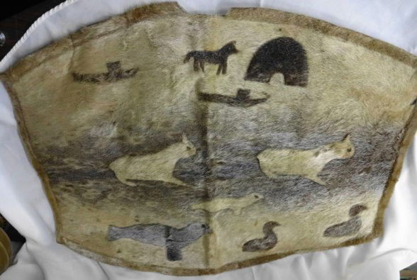 Inuit/Eskimo Sealskin Blanket Signed: Inuit/Eskimo Sealskin Blanket Decorated and Signed EmmaSize: 32-1/2" x 25-1/4"Conditon: Front design very well intact with only minor spots of hair loss. Back has been repaired on edging - some edging