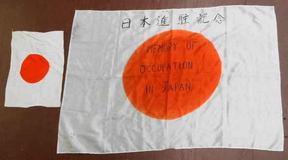 Two WW2 Era Japanese Flags: Two WW2 Era Japanese Flags - both in silk Size: Smaller flag 13-1/2" x 9-3/4" - Larger flag 36" x 25". Condition: Soiling to both cloths - some pulls and pin holes to larger flag and stain mark on edg