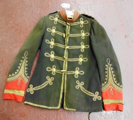 1870s British Officers Tunic: 1870s British Officers Tunic with heavy brocade decoration. All buttons and medallions in tact. Machined and hand stitching. Condition: Loss noted to brocade, Fabric appears good, interior separation 