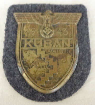 WW2 German Panzer Recon Kuban Shield: WW2 German Panzer Recon Kuban Shield Badge 1943. Size: 3" x 2-1/2" Condition: Has been mounted on a piece of wool uniform cloth, Provenance: Private Collector