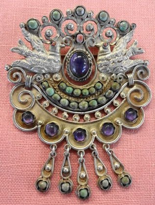 Antique Sterling Mexican Brooch, Signed & Numbered: Sterling turquoise, coral, and amethyst. Marked with maker's mark and 925 silver. Dimension: 2 1/2" x 3" Condition: Very good Provenance: Connecticut Estate