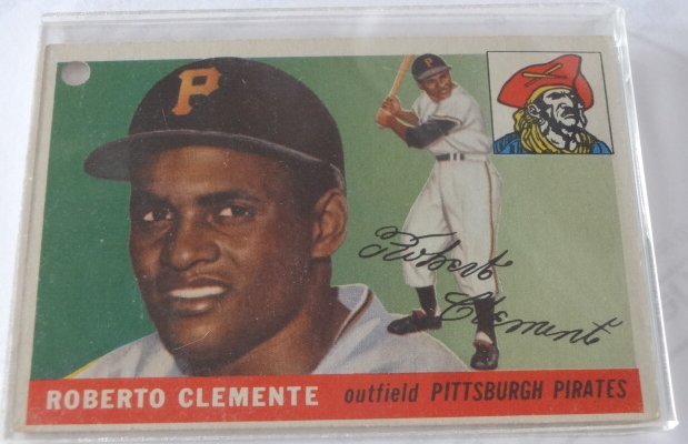 1955 Topps #164 Roberto Clemente Rookie Card. Nice: 1955 Topps #164 Roberto Clemente Rookie Card. Nice Clemente card with good coloring and clean back side. Ungraded, estate found. Hole punched in upper left corner.