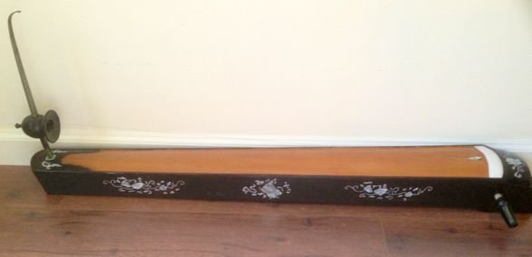 Vietnamese Dan Bau Musical Instrument: Description: Elaborate mother of pearl flower inlay.Modified for electric amplification, single stringed instrument with pitch bending bat.Dimension:Condition: Very goodProvenance: Connecticut Estate